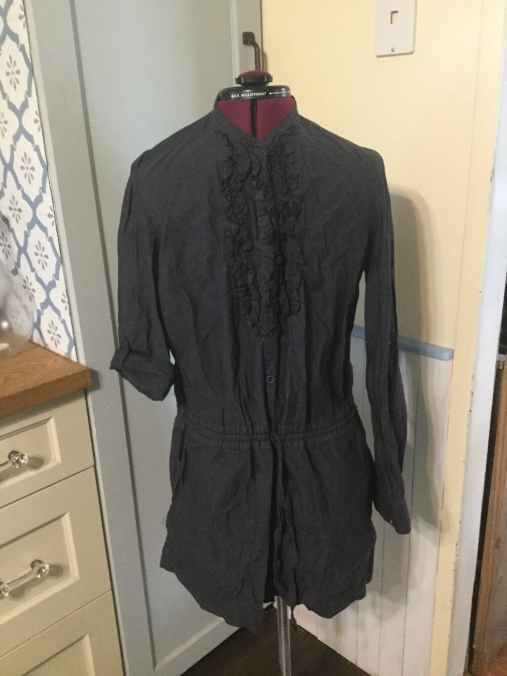 Joe fresh tunic style top dark navy in color size large ruffle button front tie